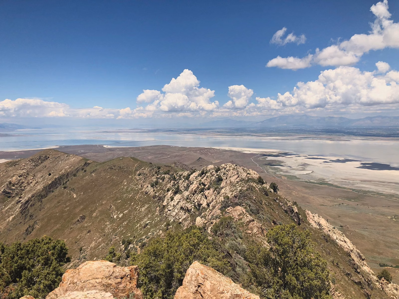 Rocky ridge and green slopes of Antelope Island's high country above Great Salt Lake