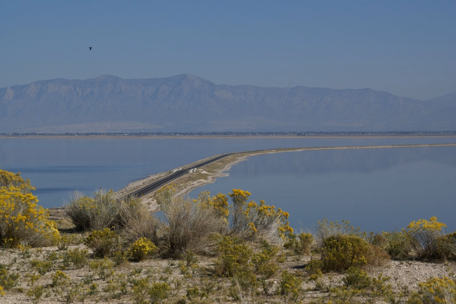 The Davis County Causeway stretching across Great Salt Lake toward the mainland, seen from Antelope Island